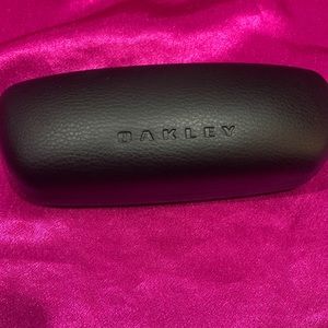 Oakley black sunglasses case. Like new. Soft inside. Hard case